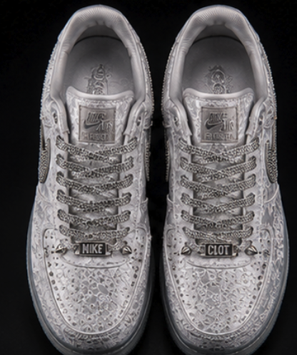Overhead view of the pair showing crystal lacing and engraved metal lace plates