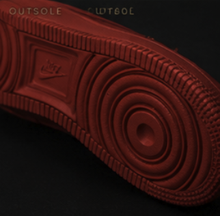 Tonal red outsole of the low-top