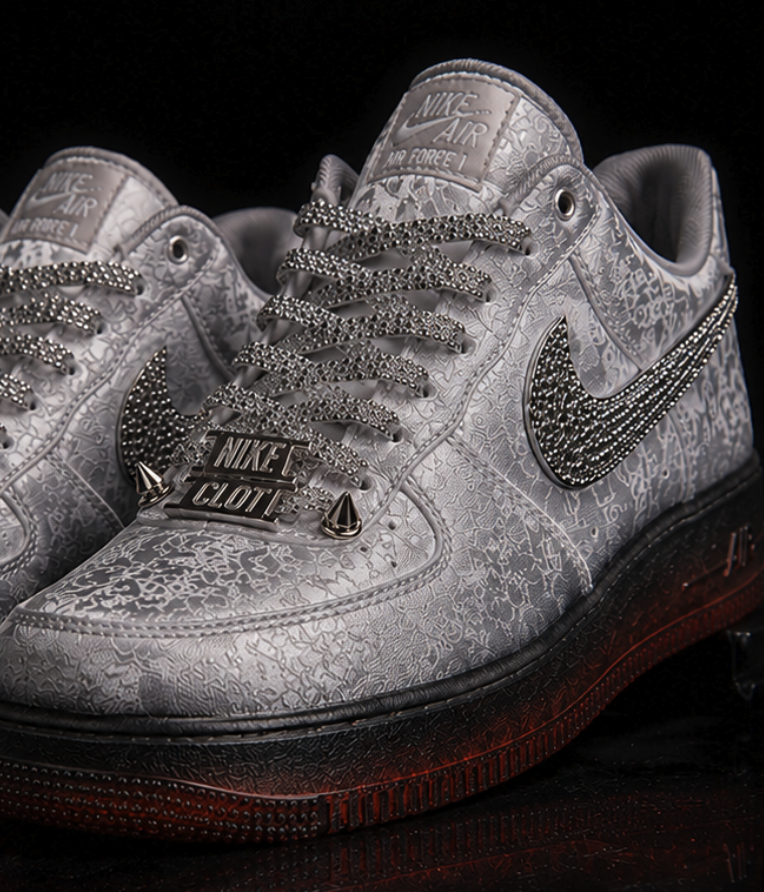 Pair of silver embossed sneakers with crystal-set swooshes and metallic lace plates