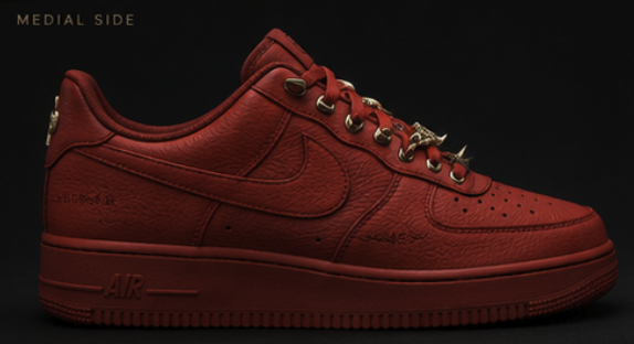 Medial side profile of the red leather low-top